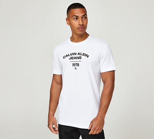 Calvin Klein Jeans Varsity Curve Logo T-Shirt | Bright White | Footasylum