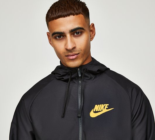 Nike Standard Issue Spray Woven Full Zip Hoodie | Black | Footasylum