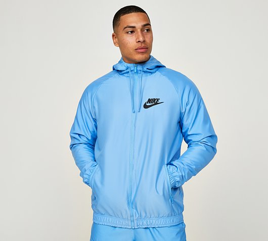 Nike Standard Issue Spray Woven Full Zip Hoodie | University Blue ...