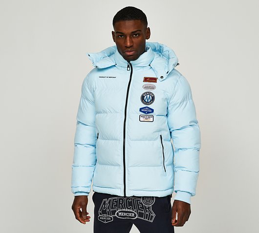 Mercier OG Hybrid Badge Puffer Jacket | Placid Blue | Footasylum