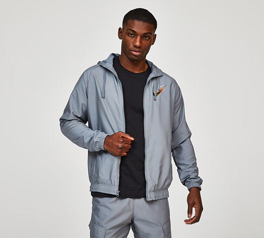 Nike Standard Issue Moto Woven Light Jacket | Cool Grey | Footasylum