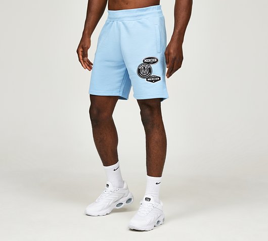 Mercier Mono Badge Fleece Short | Placid Blue / Mono | Footasylum