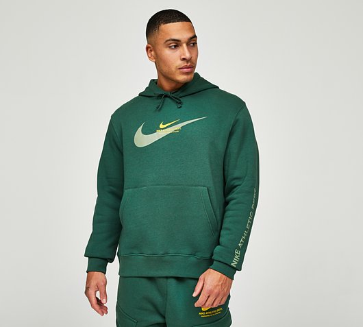 Nike Standard Issue Pullover Hoodie | Fir | Footasylum