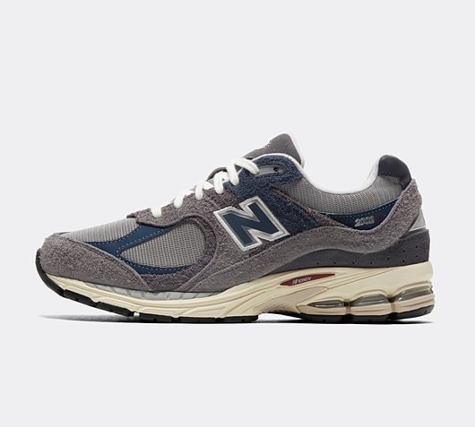 New Balance 2002R Trainer | Dark Grey / Navy / White | Footasylum