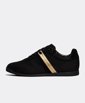 black and gold boss trainers