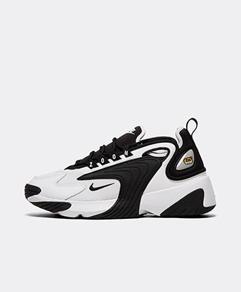 nike black trainers white tick womens