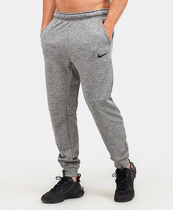 dark grey nike tracksuit bottoms