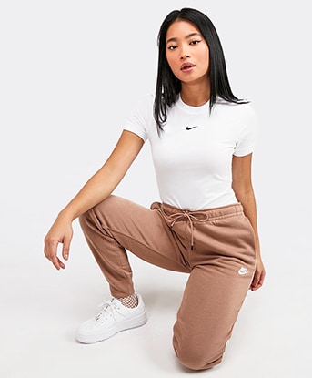 nike lilac essentials slim joggers