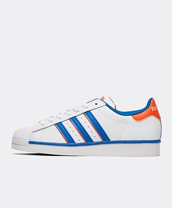 adidas trainers blue with orange stripes