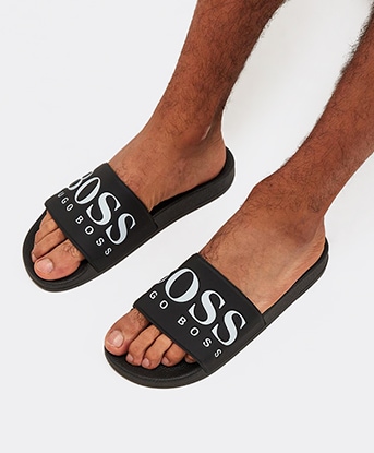 black and gold hugo boss sliders