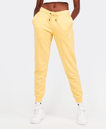 yellow nike joggers womens