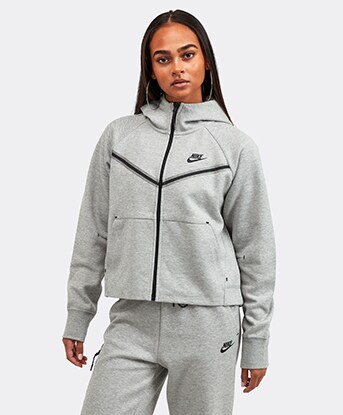 light blue nike tech suit