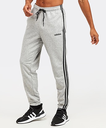 three striped cuff joggers by adidas