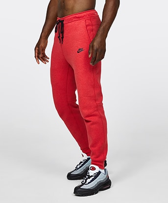Red nike tech best sale sweatpants