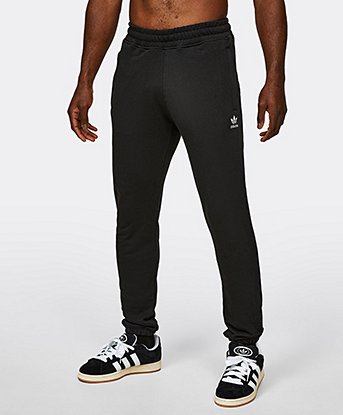 Nike club essentials panelled cuffed joggers in black hotsell